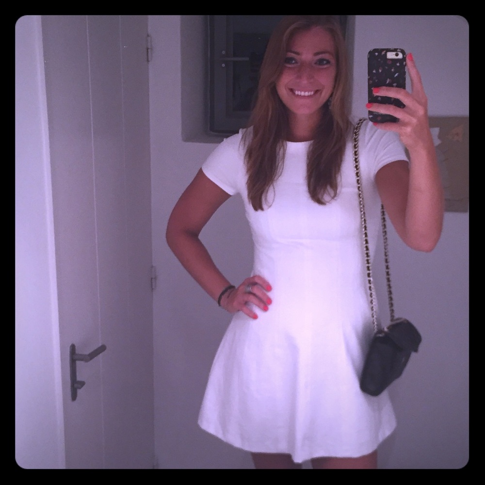 White structures cap sleeve babydoll dress